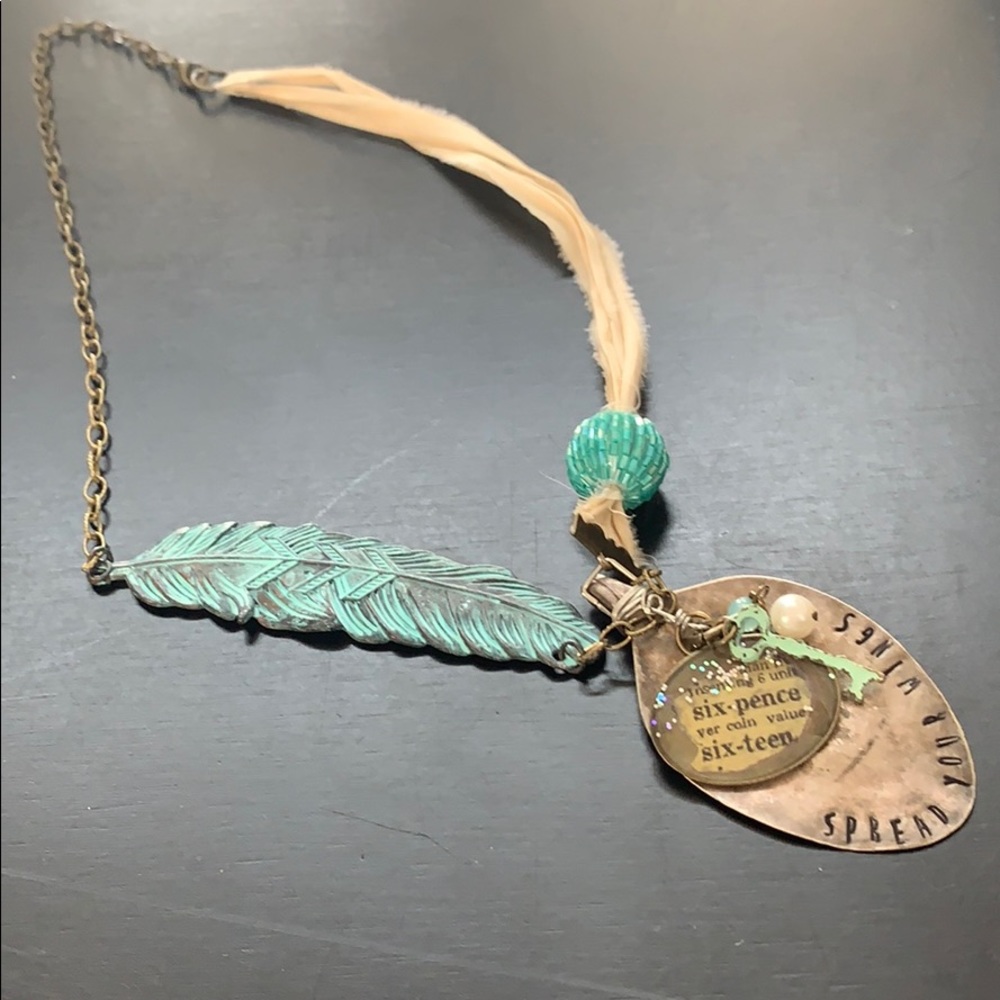 One of a kind necklace. “Spread your wings”